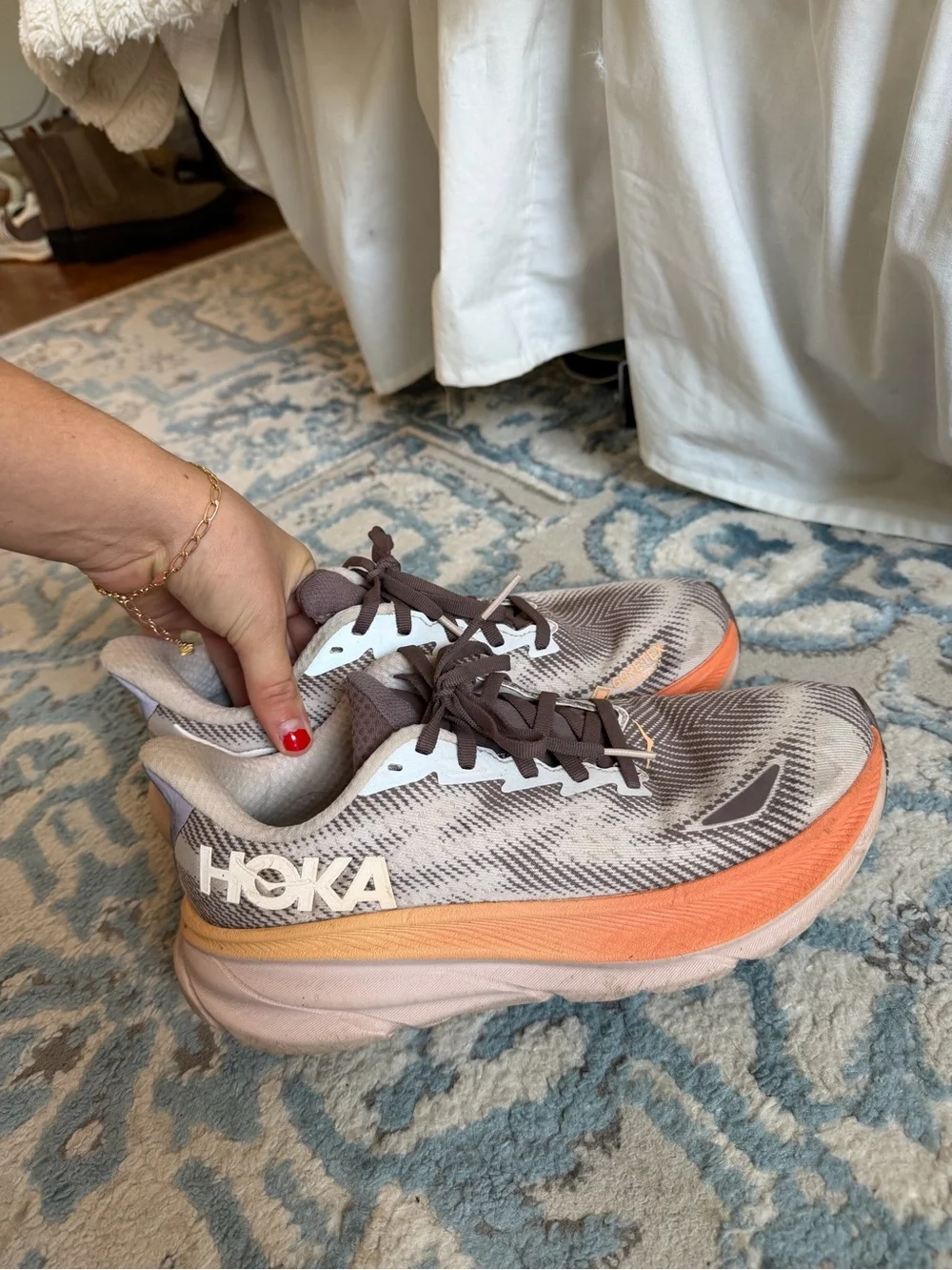 Hoka Women's Clifton Running Shoes in Brown and Orange